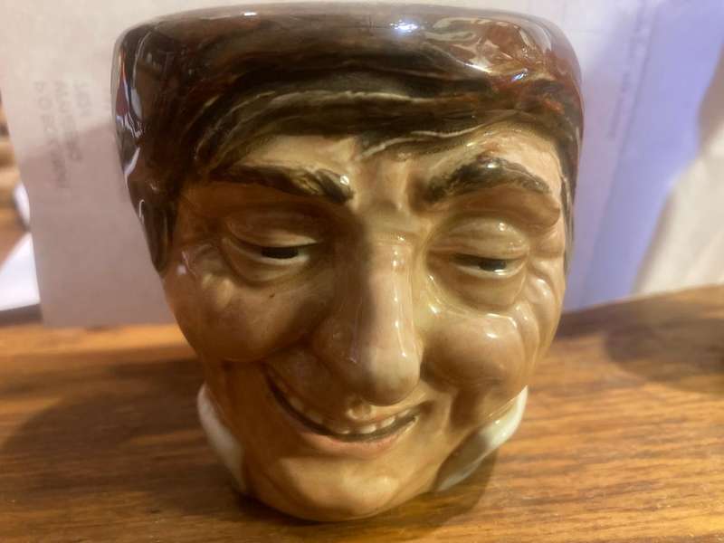 Collection of Royal Doulton character jugs , ashtrays and candle snufflers