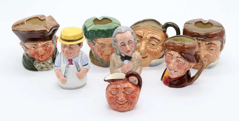 Collection of Royal Doulton character jugs , ashtrays and candle snufflers