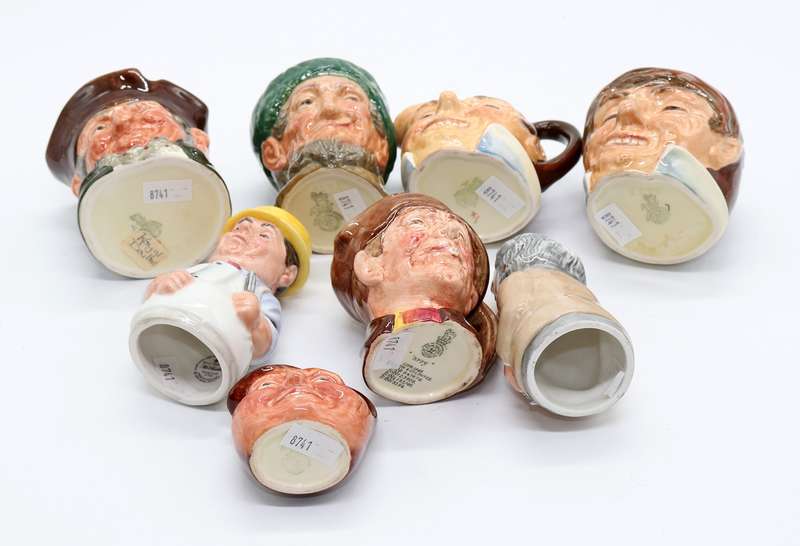 Collection of Royal Doulton character jugs , ashtrays and candle snufflers