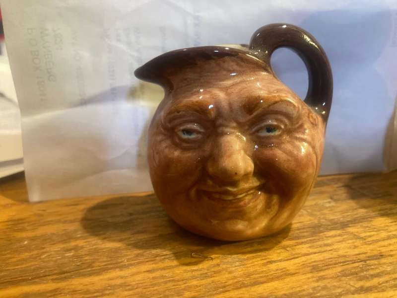 Collection of Royal Doulton character jugs , ashtrays and candle snufflers