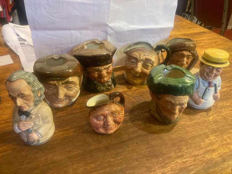 Collection of Royal Doulton character jugs , ashtrays and candle snufflers