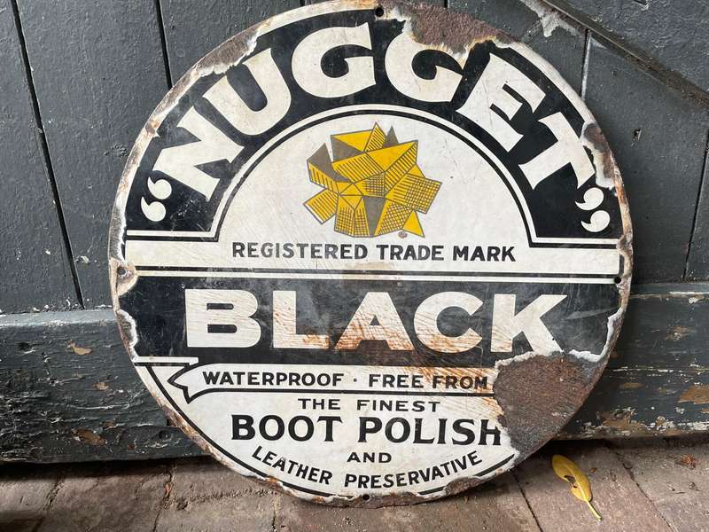Rare Nugget Shoe Chair plus 2 original Nugget Enamel Signs