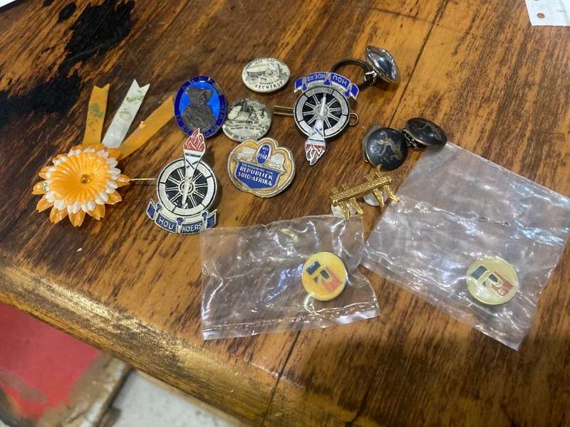 Collection of Afticana Pins and Badges