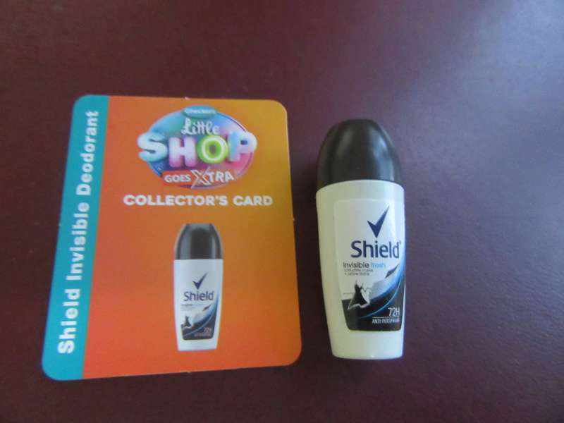 CHECKER'S LITTLE SHOP GOES XTRA - SHIELD
