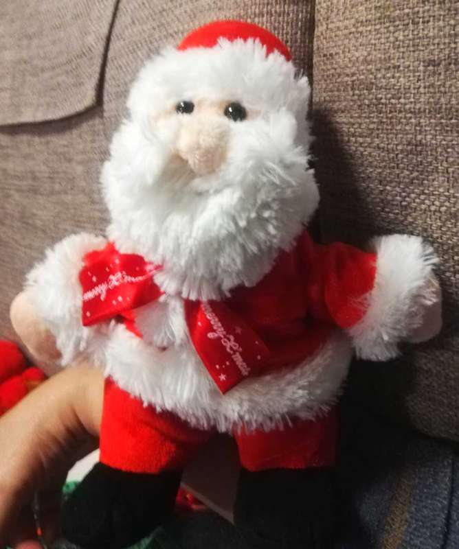 Plush Santa toy with satin bow. 24cm.