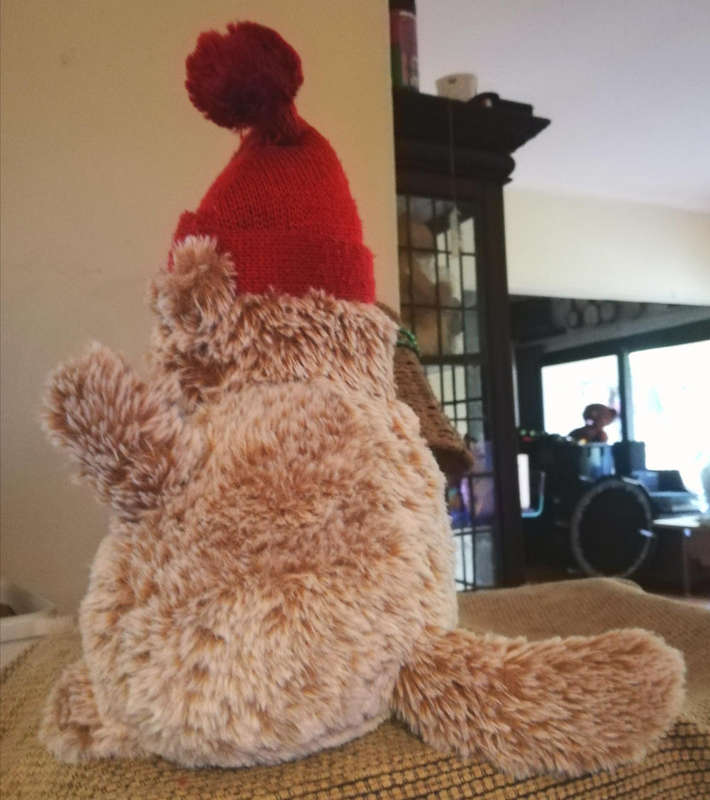 Adorable Plush Larry the Lavea Teddy Bear in Festive Red Hat - 30cm Cuddly Toy!