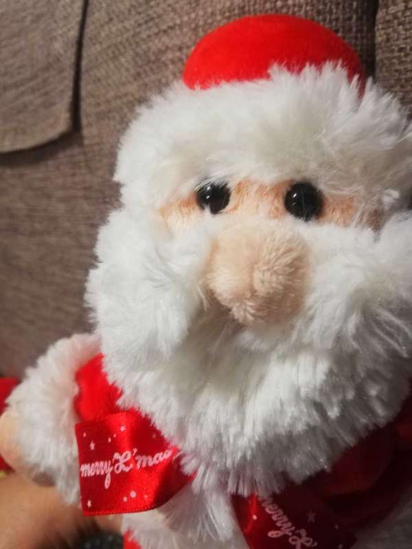 Plush Santa toy with satin bow. 24cm.