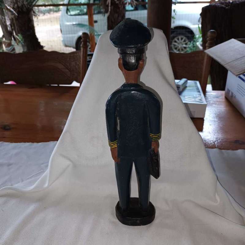 Colonial wooden figurine