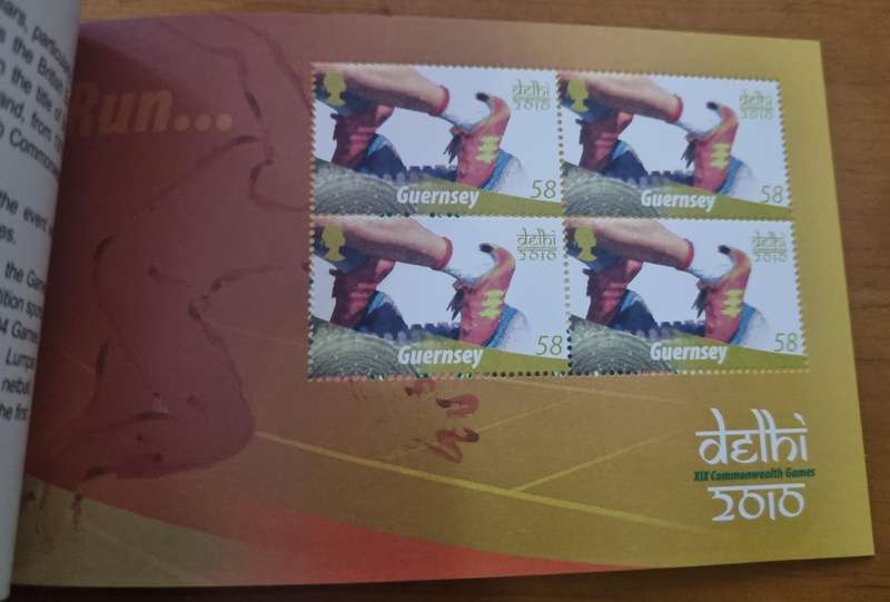 GUERNSEY 2010 COMMONWEALTH GAMES DELHI INDIA PRESTIGE BOOKLET MINT AND COMPLETE. SB95. LOVELY ITEM.
