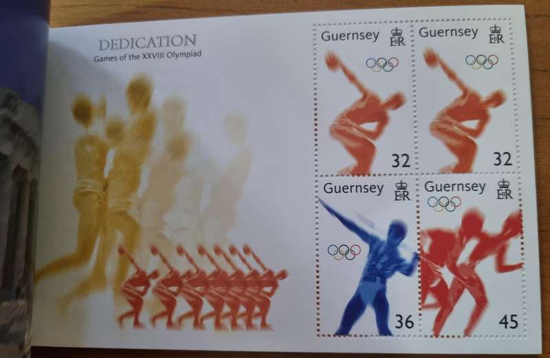 GUERNSEY 2004 DEDICATION GAMES OF THE XXIII OLYMPIAD MINT PRESTIGE BOOKLET. AS PER IMAGES. SB77.