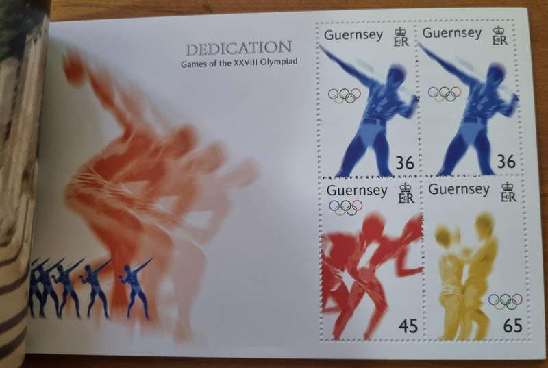 GUERNSEY 2004 DEDICATION GAMES OF THE XXIII OLYMPIAD MINT PRESTIGE BOOKLET. AS PER IMAGES. SB77.