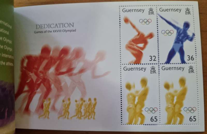 GUERNSEY 2004 DEDICATION GAMES OF THE XXIII OLYMPIAD MINT PRESTIGE BOOKLET. AS PER IMAGES. SB77.