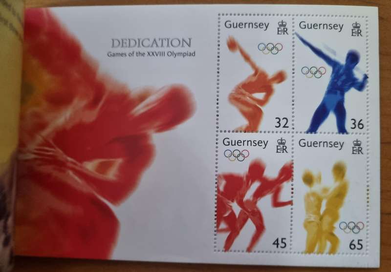 GUERNSEY 2004 DEDICATION GAMES OF THE XXIII OLYMPIAD MINT PRESTIGE BOOKLET. AS PER IMAGES. SB77.