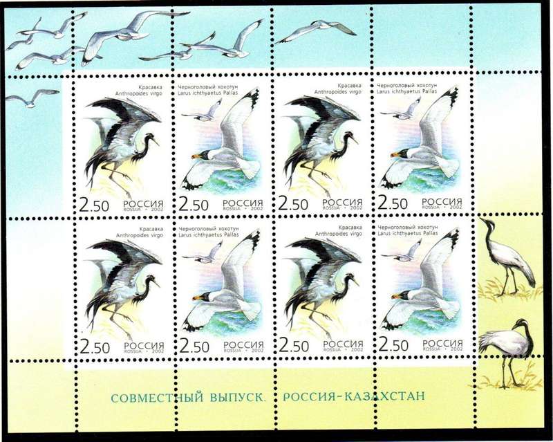 RUSSIA 2002 ENDANGERED SPECIES - BIRDS UMM SETENANT SHEET OF (X8). SG7113/4. AS PER SCANS.