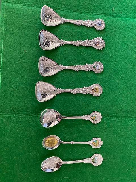SET OF COLLECTABLE SPOONS
