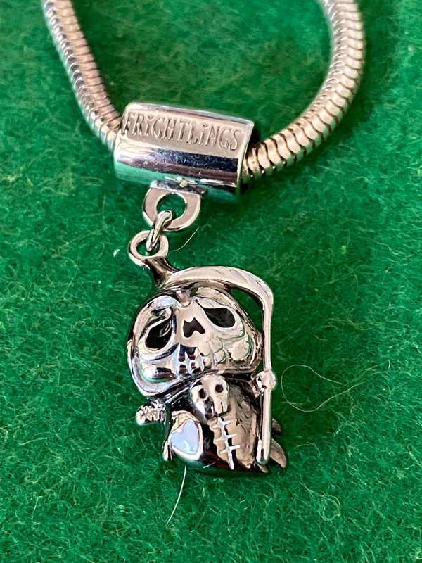 FRIGHTLINGS UK SOLID SILVER CHARM AND BRACELET