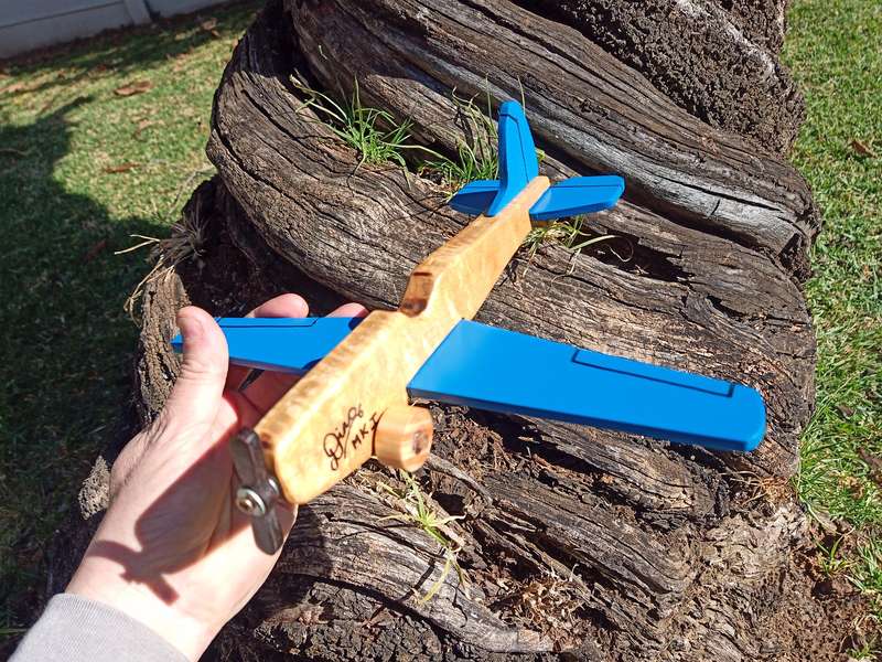 Dino Vintage style wooden toy aeroplane.