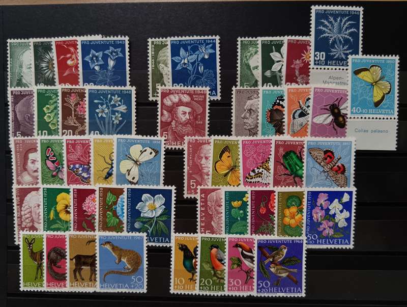 Switzerland lot of 48 Pro Juventute stamps - MH and MNH - 1943 to 1968