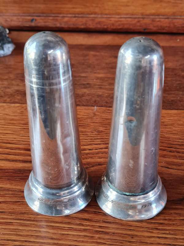Stainless Steel Salt And Pepper Holders - Height 13 cm.