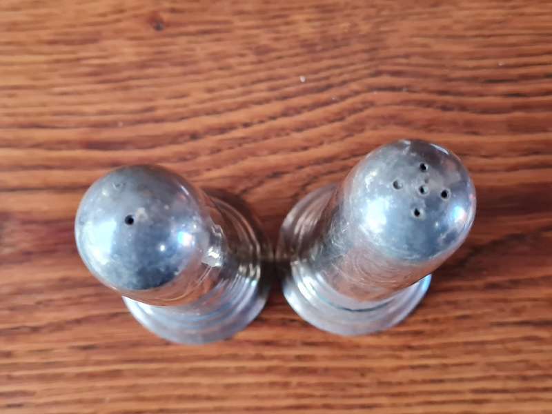 Stainless Steel Salt And Pepper Holders - Height 13 cm.