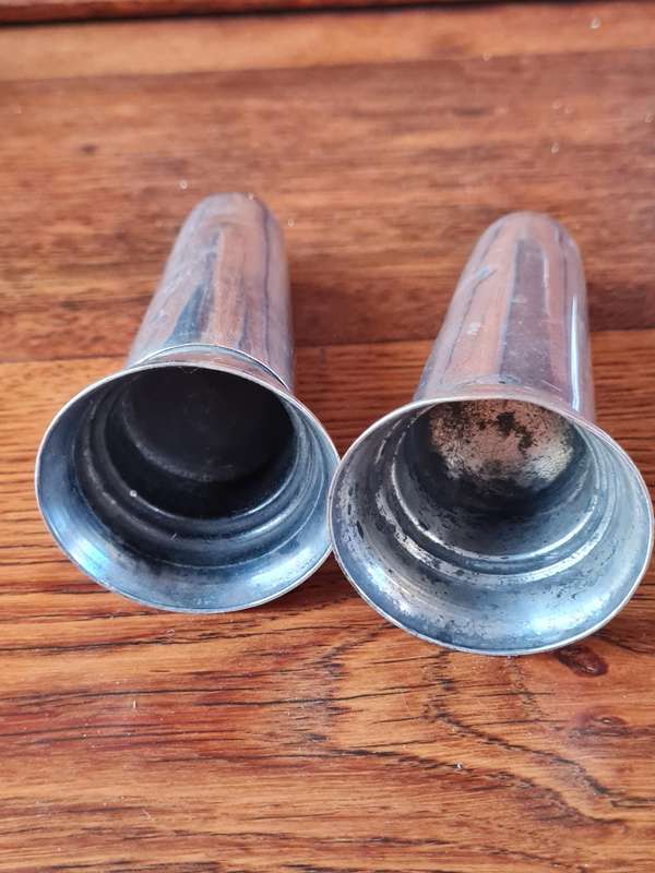 Stainless Steel Salt And Pepper Holders - Height 13 cm.