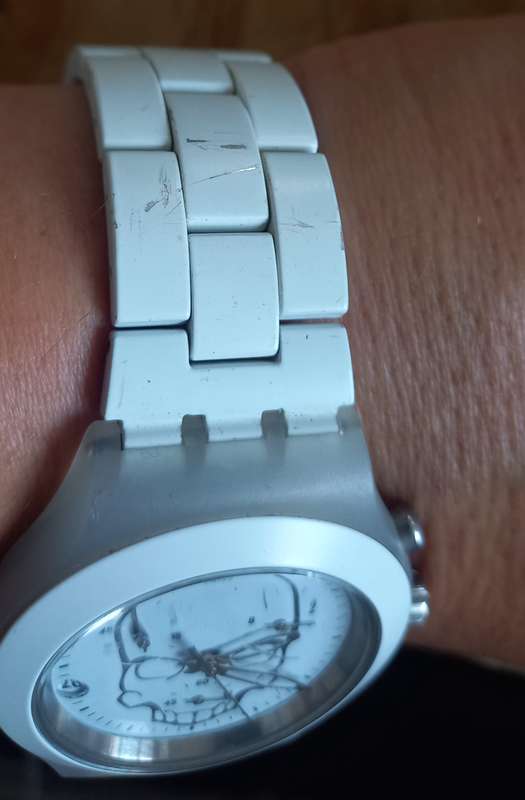Swatch Irony White with skull theme