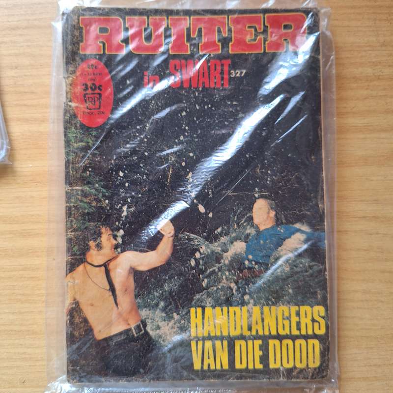 Ruiter in swart vintage action pucture book no.327