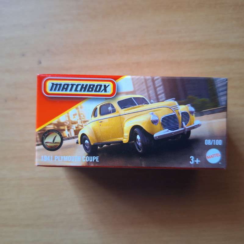 Matchbox 1941 yellow Plymouth in unopened box 8/100