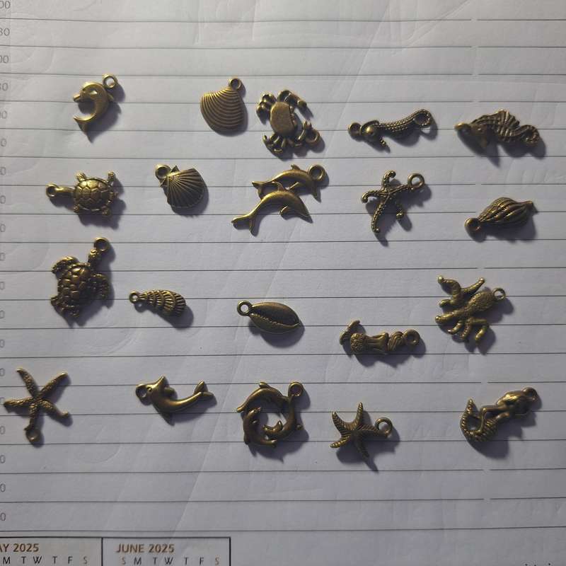 20 x Elegant antique sea bronze charms