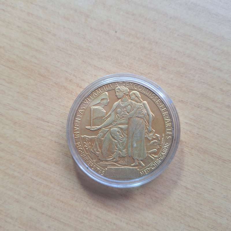 Nobel golden color Replica coin in capsule