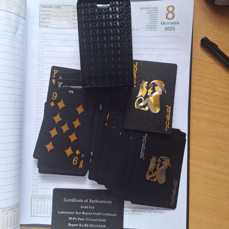 Pack of black playing cards -certificate of 99.9% pure carat gold