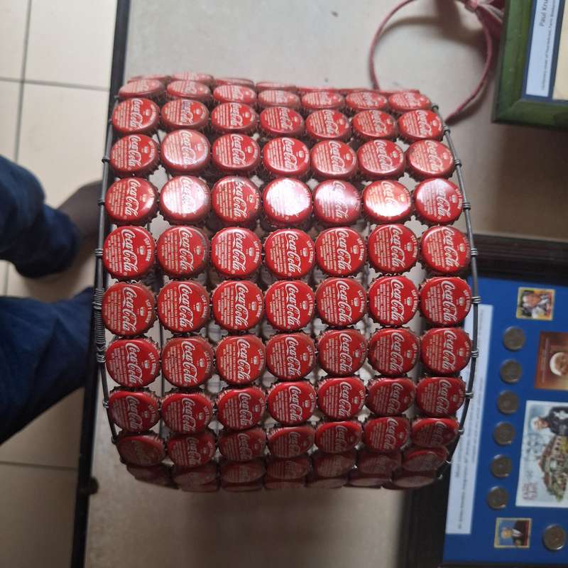 Lamp shade made from over 200 coca cola caps from 1999