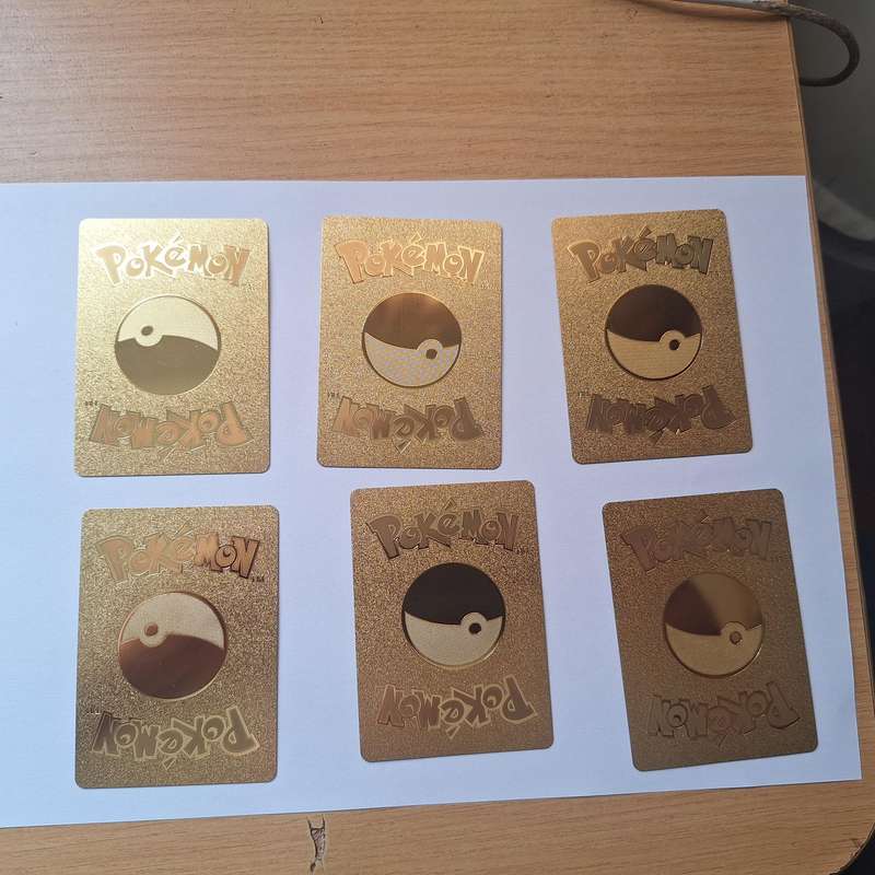 6 x gold colored pokemon cards