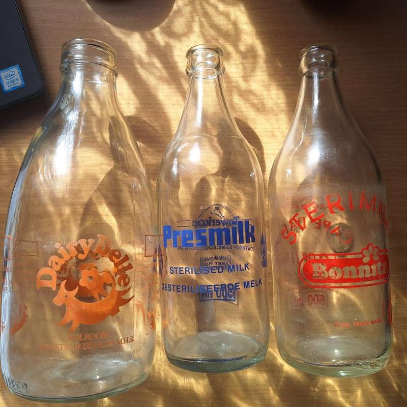 3 vintage old milk bottles
