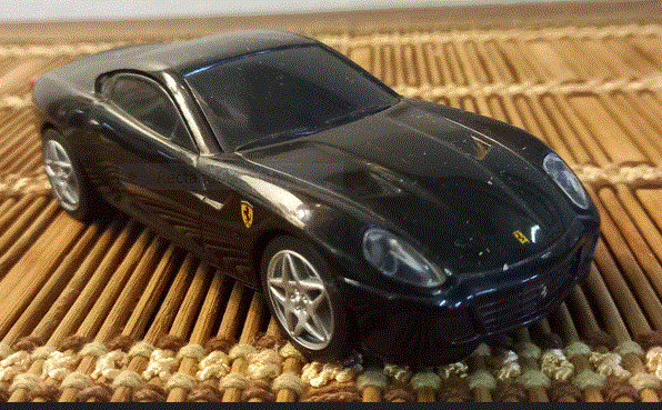 Ferrari 599GTB  Fiorano  Cast Model   Scale 1/38  E/Make  V Power     Excellent .
