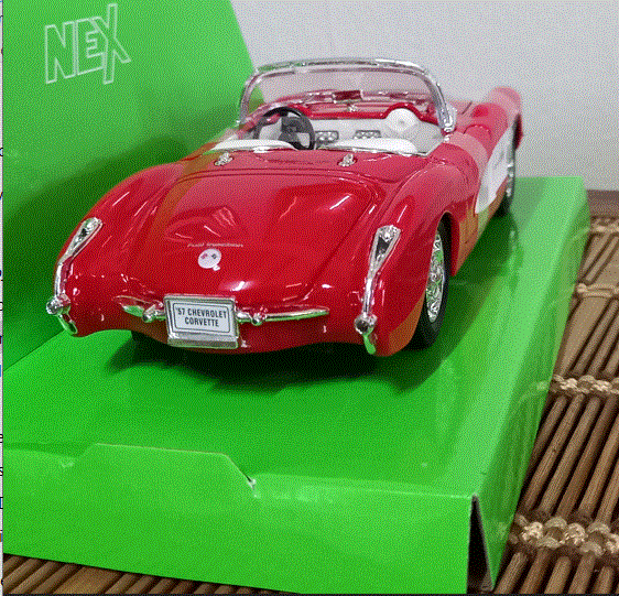 '57 Chevrolet Corvette Roadster Die Cast Model   Scale  1/24 New in D/Box -WELLY NEX        Q/ Disc.