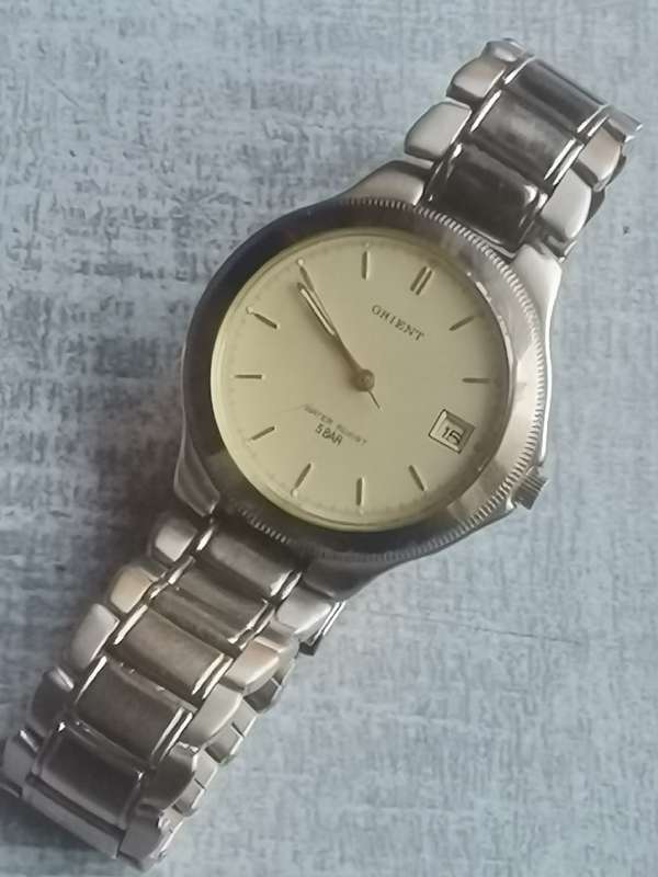 VINTAGE MENS ORIENT GOLD PLATED QUARTZ WATCH IN EXCELLENT WORKING CONDITION