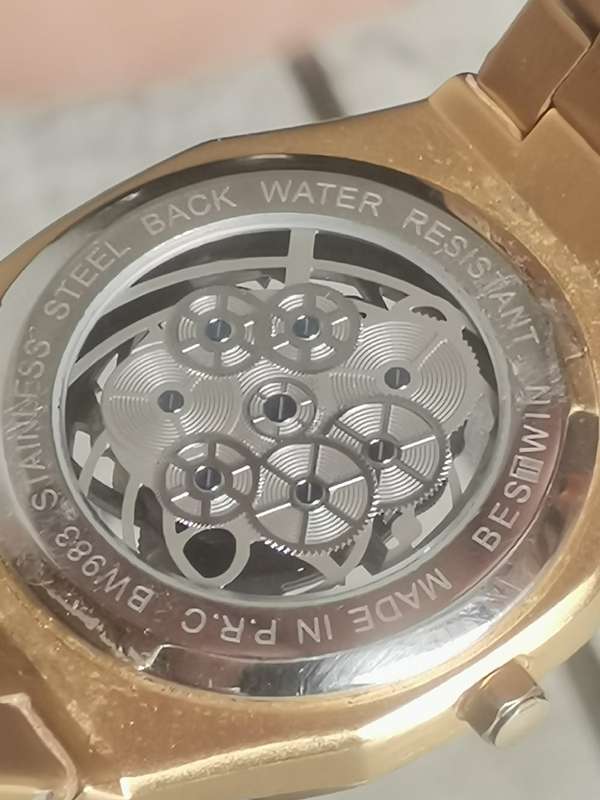 BESTWIN MENS GOLD SKELETON WATCH IN EXCELLENT WORKING CONDITION
