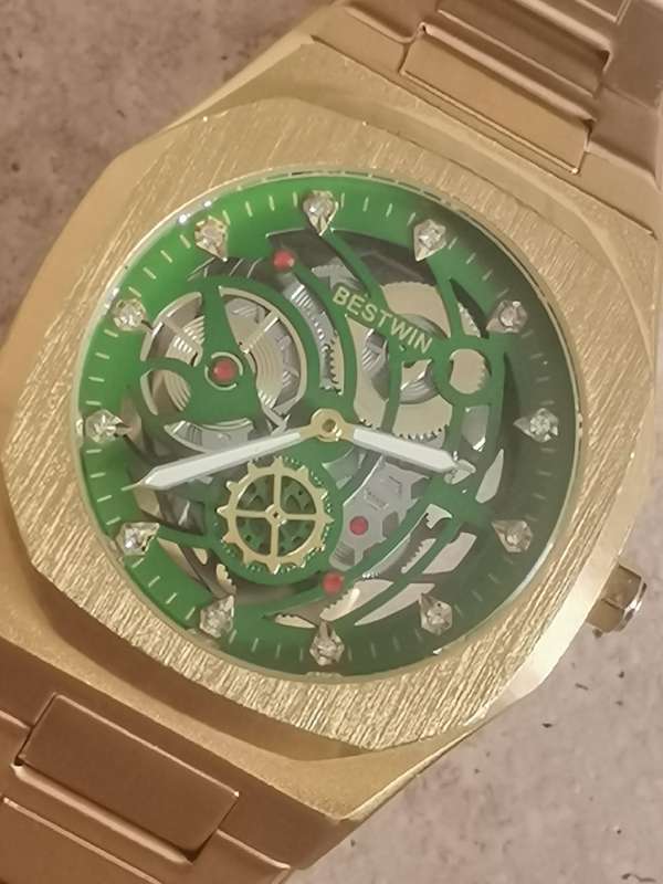 BESTWIN MENS GOLD SKELETON WATCH IN EXCELLENT WORKING CONDITION