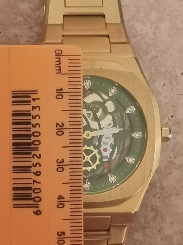BESTWIN MENS GOLD SKELETON WATCH IN EXCELLENT WORKING CONDITION