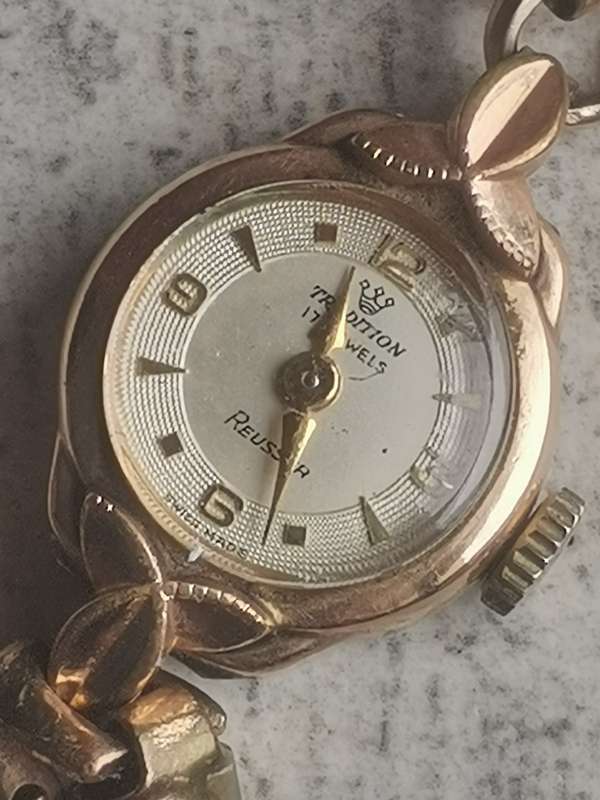 VINTAGE LADIES TRADITION REUSSER 17 JEWELS 20 MICRON GOLD WATCH IN EXCELLENT WORKING CONDITION