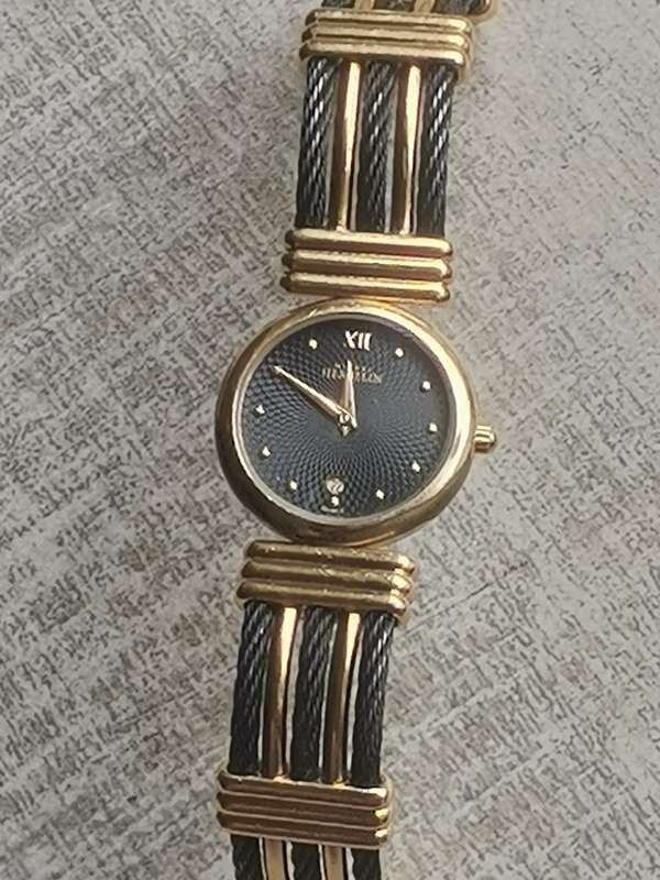 STUNNING LADIES MICHEL HERBELIN GOLD AND BLACK CABLE WATCH IN EXCL WORKING COND - VALUED OVER R15K
