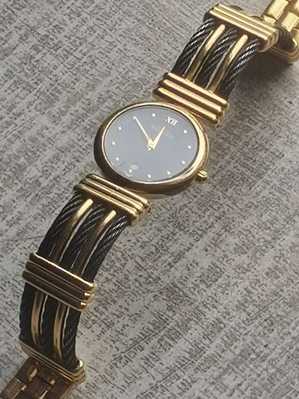 STUNNING LADIES MICHEL HERBELIN GOLD AND BLACK CABLE WATCH IN EXCL WORKING COND - VALUED OVER R15K