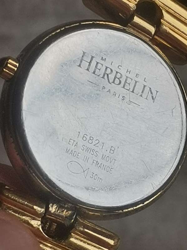 STUNNING LADIES MICHEL HERBELIN GOLD AND BLACK CABLE WATCH IN EXCL WORKING COND - VALUED OVER R15K