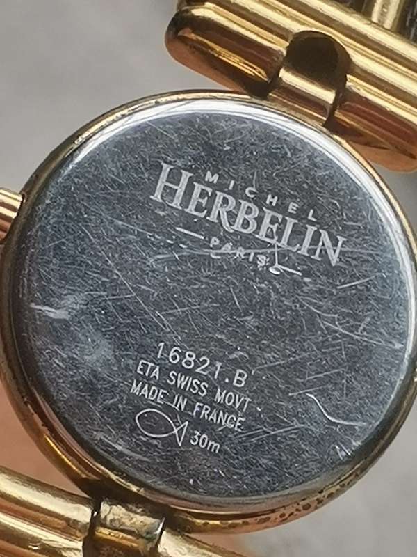 STUNNING LADIES MICHEL HERBELIN GOLD AND BLACK CABLE WATCH IN EXCL WORKING COND - VALUED OVER R15K