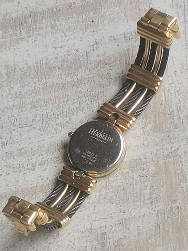 STUNNING LADIES MICHEL HERBELIN GOLD AND BLACK CABLE WATCH IN EXCL WORKING COND - VALUED OVER R15K