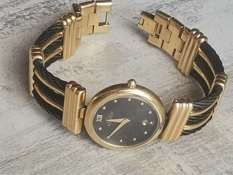 STUNNING LADIES MICHEL HERBELIN GOLD AND BLACK CABLE WATCH IN EXCL WORKING COND - VALUED OVER R15K