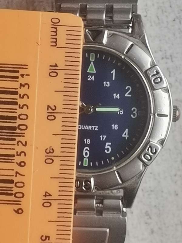 STUNNING MENS ROTATING BEZEL WATCH WITH STAINLESS STEEL SWATCH STRAP IN EXCELLENT WORKING CONDITION