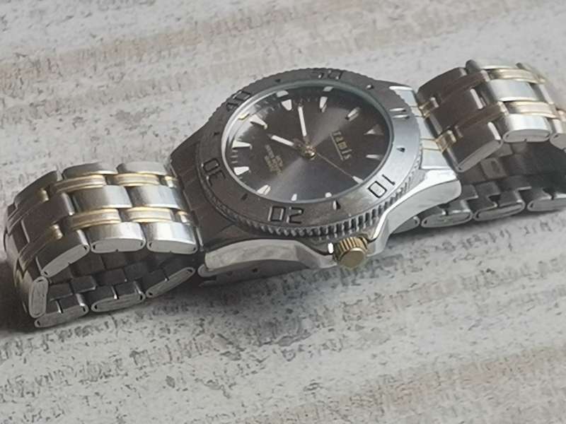 MENS FULL STAINLESS STEEL ARAMIS WATCH WITH ROTATING BEZEL IN EXCELLENT WORKING CONDITION
