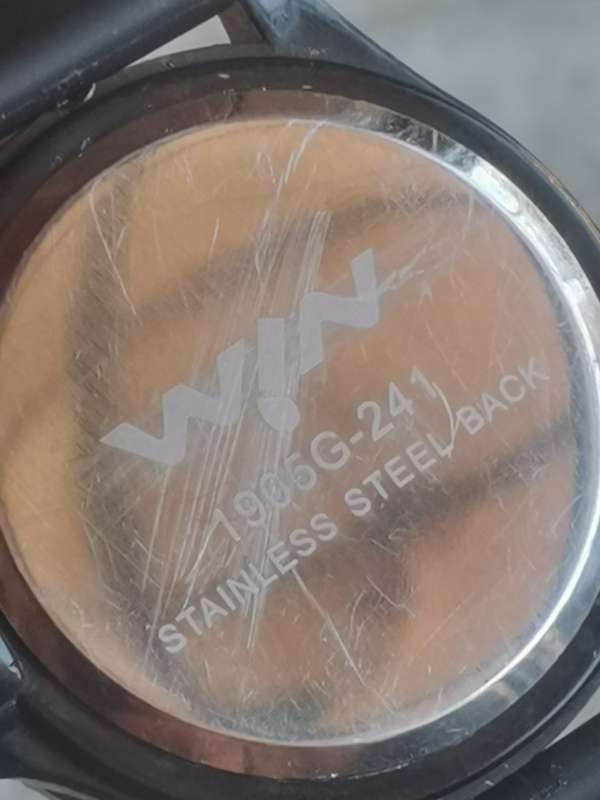 MENS WIN WATCH WITH ROTATING BEZEL IN EXCELLENT WORKING CONDITION